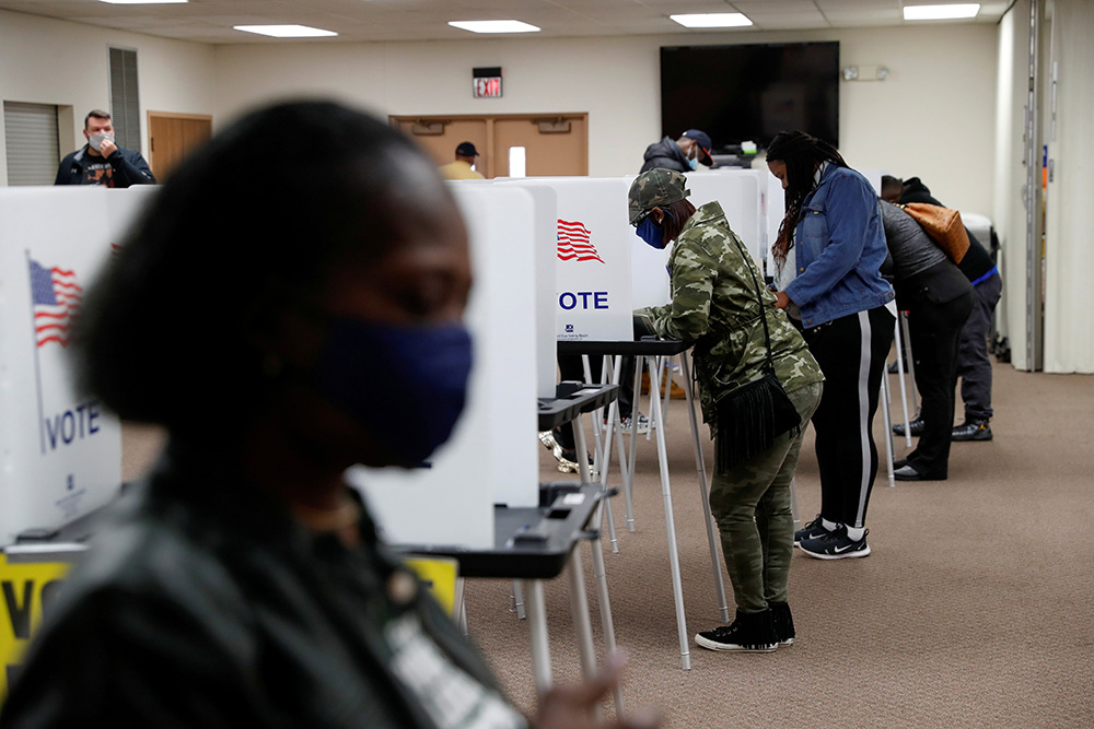 People vote at a polling station in Flint, Michigan, during the presidential election Nov. 3, 2020. (CNS/Reuters/Shannon Stapleton) People vote at a polling station in Flint, Michigan, during the presidential election Nov. 3, 2020. (CNS/Reuters/Shannon Stapleton)